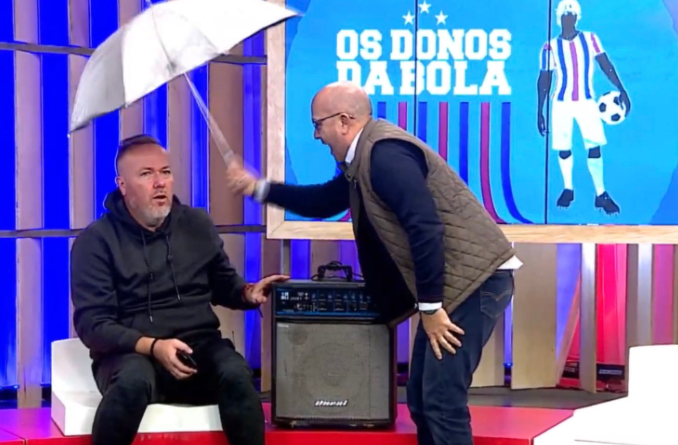 Por Douglas Costa, Cidade Dias leva caixa de som e guarda-chuva ao vivo para proteger Baldasso dos "raios" Baldasso